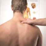 Mans back having Physiotherapy at Drive Sports Medicine